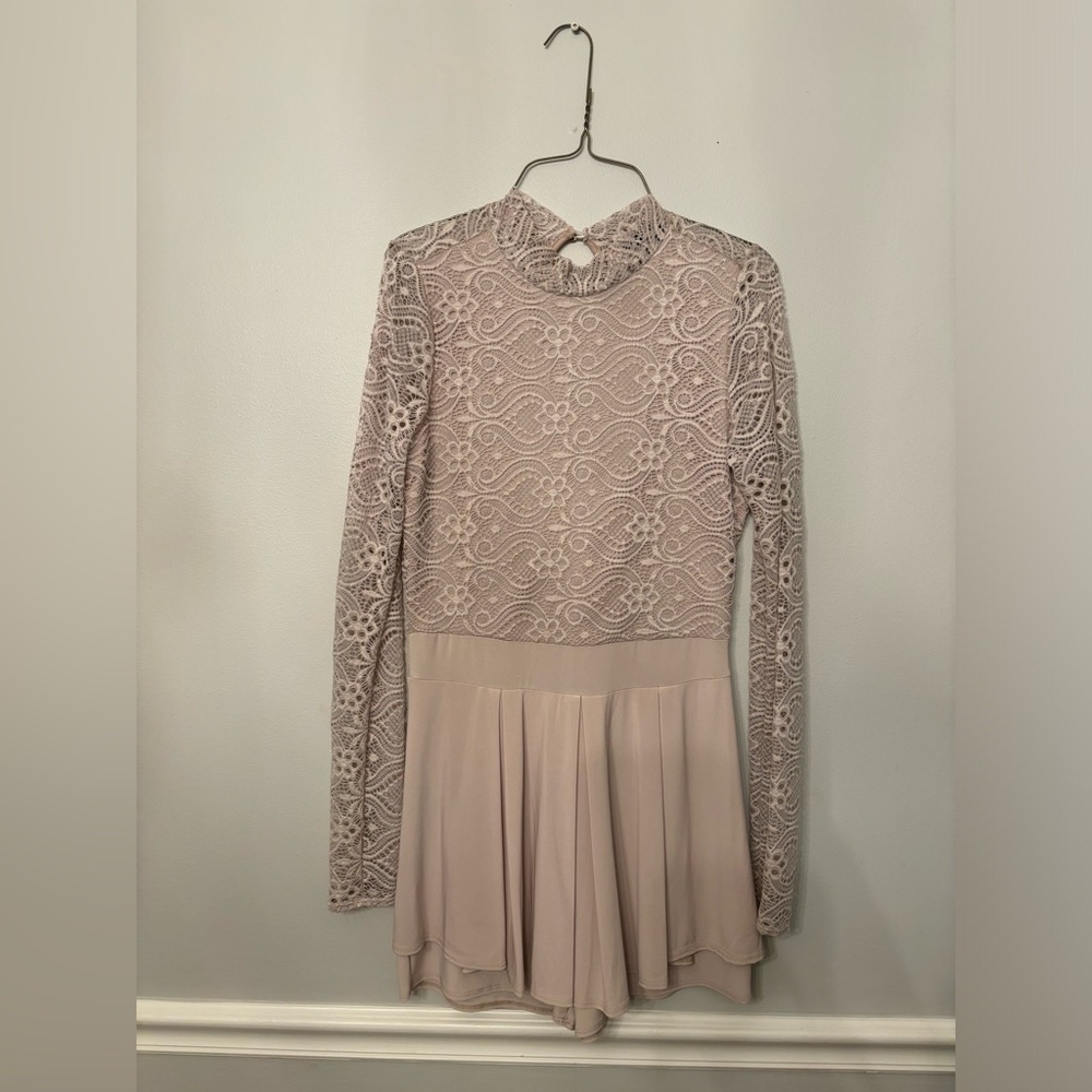 Beware brand romper. Size large.